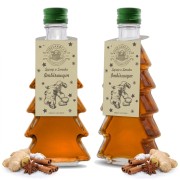 Syrop o smaku imbirowym w gładkiej szklanej butelce choince 250 ml – dwie butelki białe tło